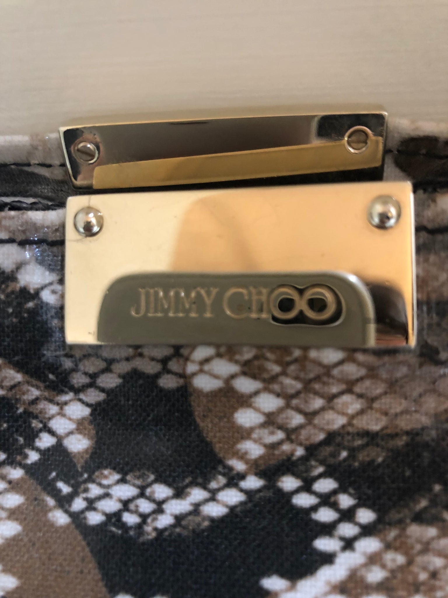 Isabella's Wardrobe Jimmy Choo Animal Print Clutch.