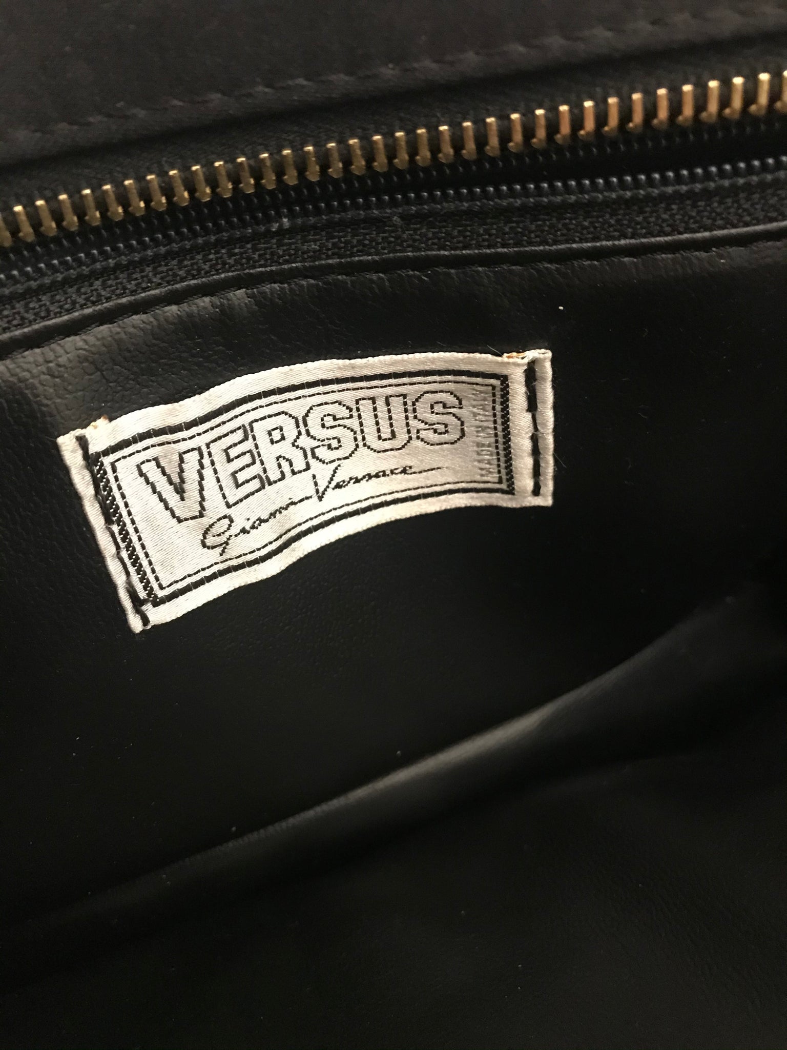 Isabella's Wardrobe Versus Versace Vintage Lion's Head Evening Bag.