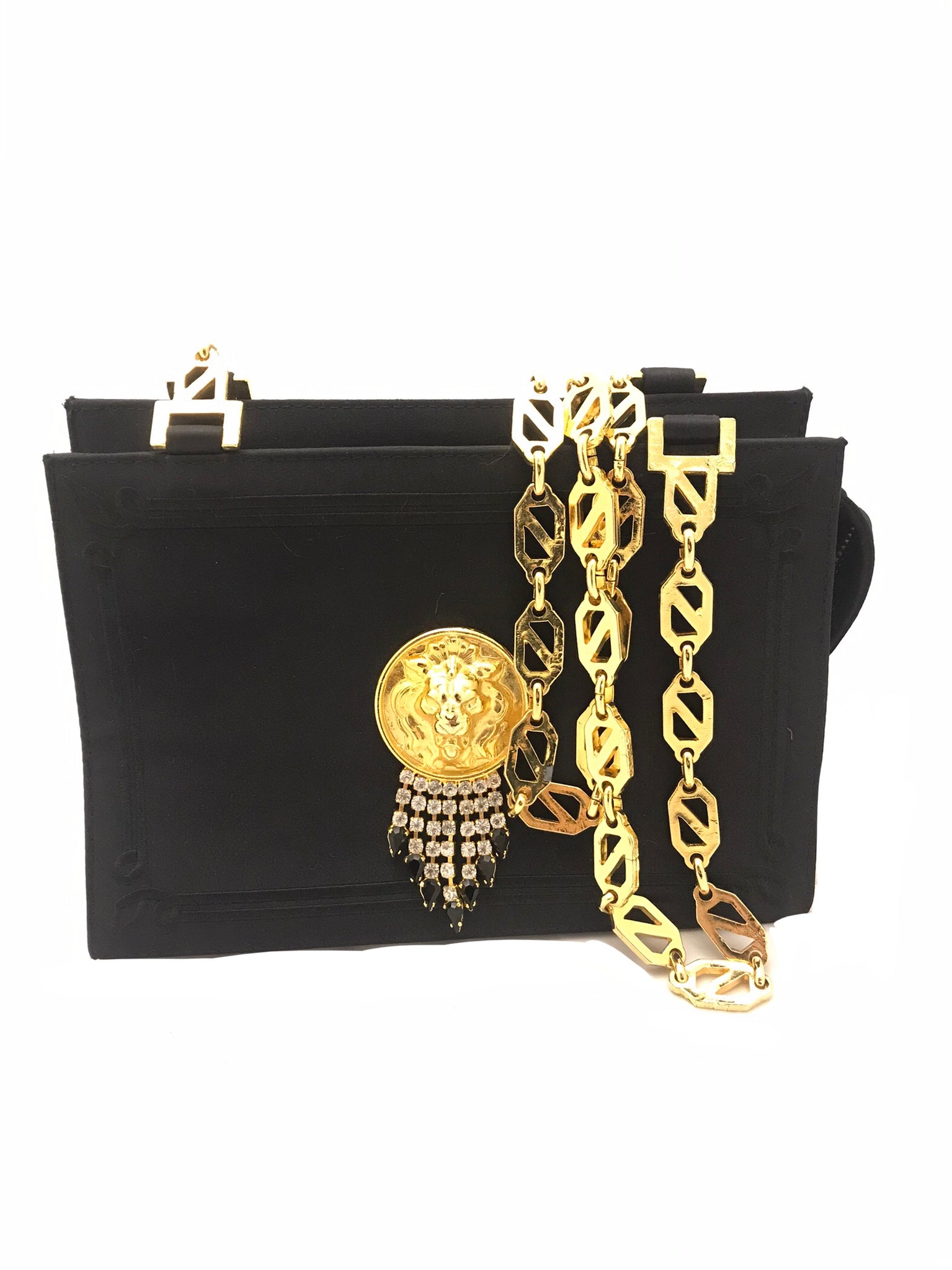 Isabella's Wardrobe Versus Versace Vintage Lion's Head Evening Bag.