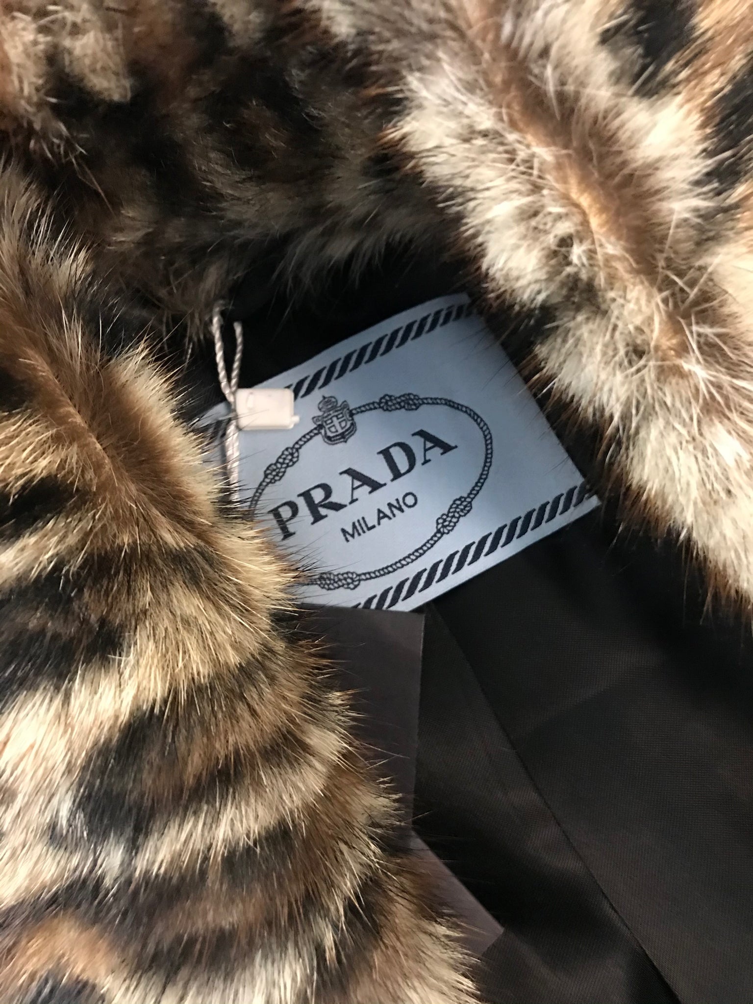 Isabella's Wardrobe Prada Houndstooth Jacket with Fur Trim.