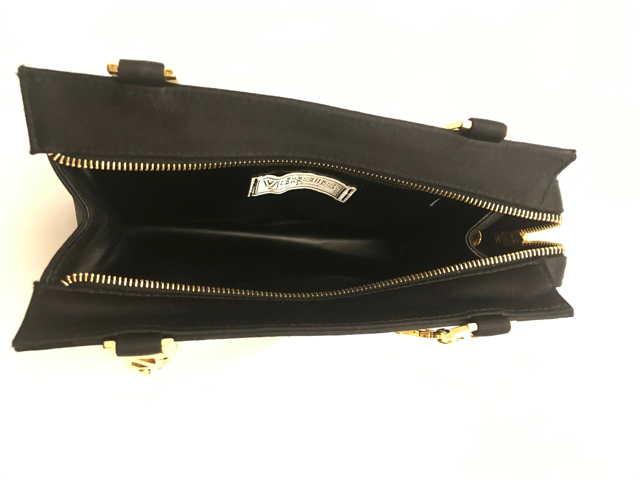 Isabella's Wardrobe Versus Versace Vintage Lion's Head Evening Bag.